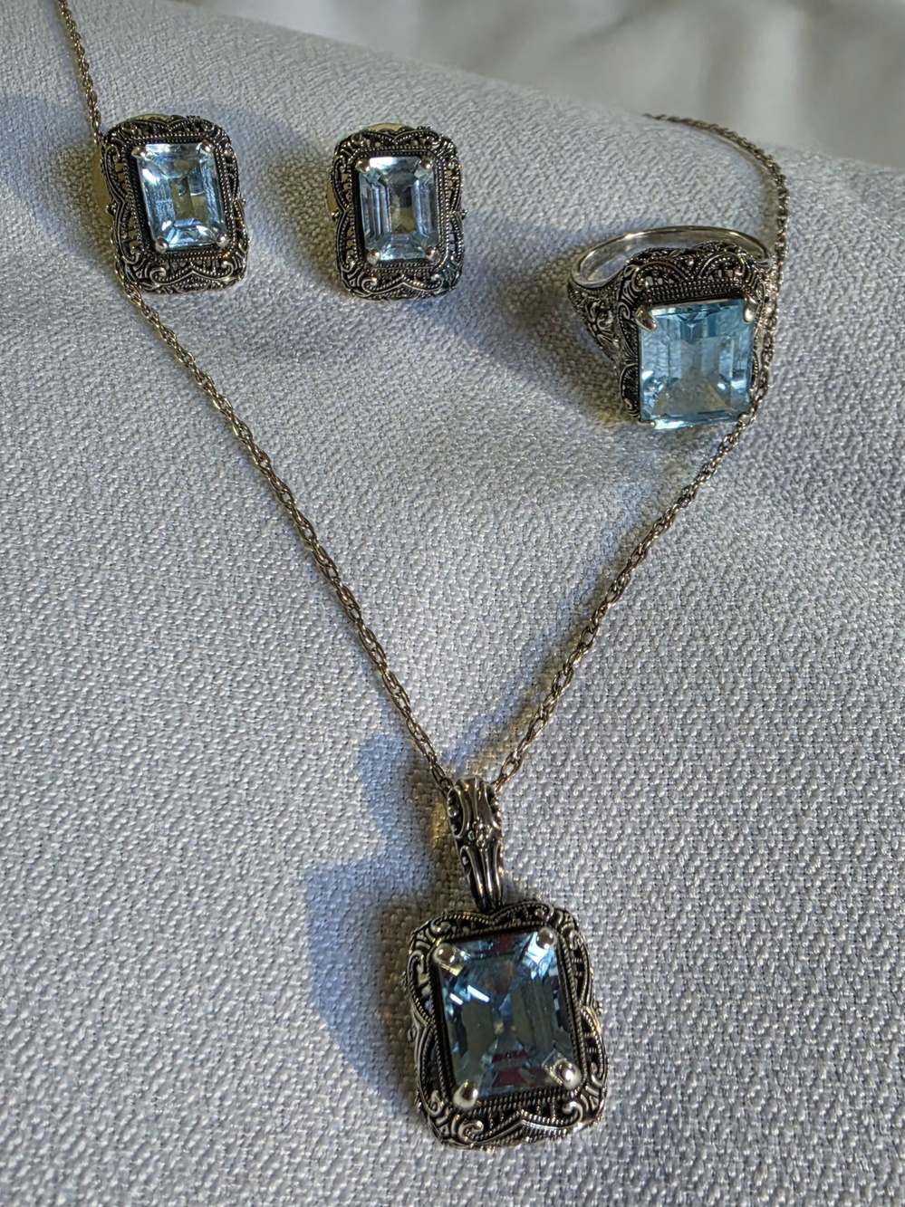 Sterling Silver Blue Topaz Jewelry Set - Pendant, Ring & Earrings
